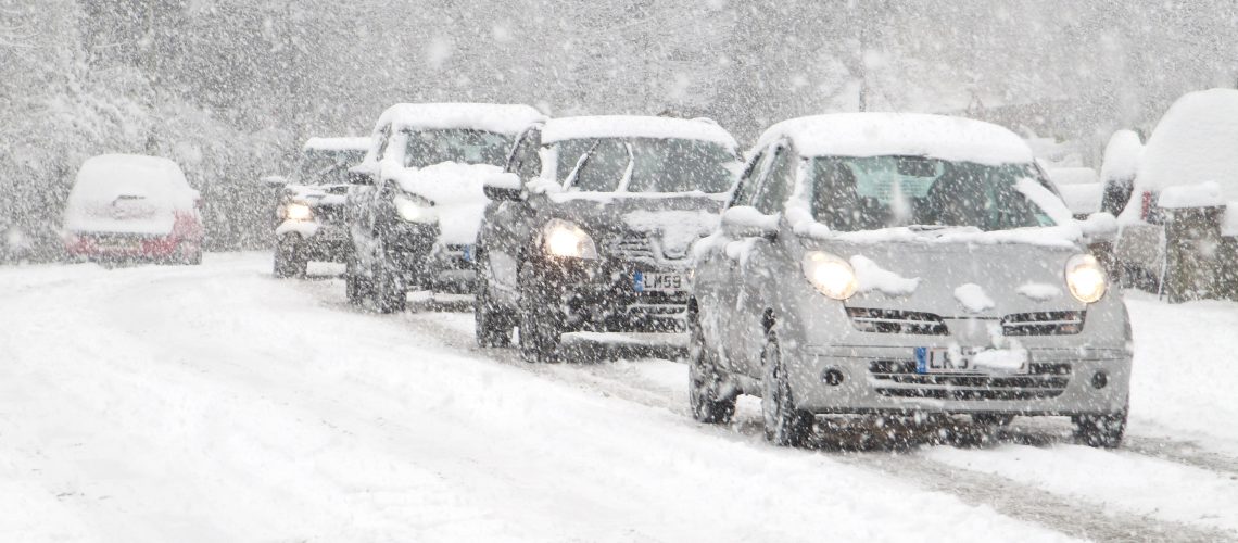 cars driving in heavy snow, winter driving