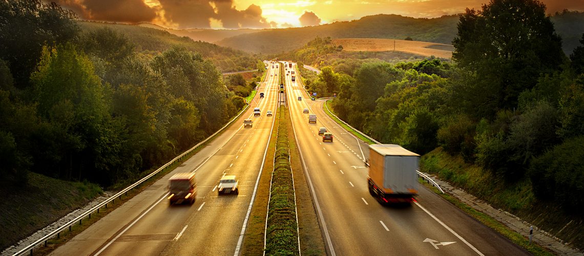 Highway trafin in sunset